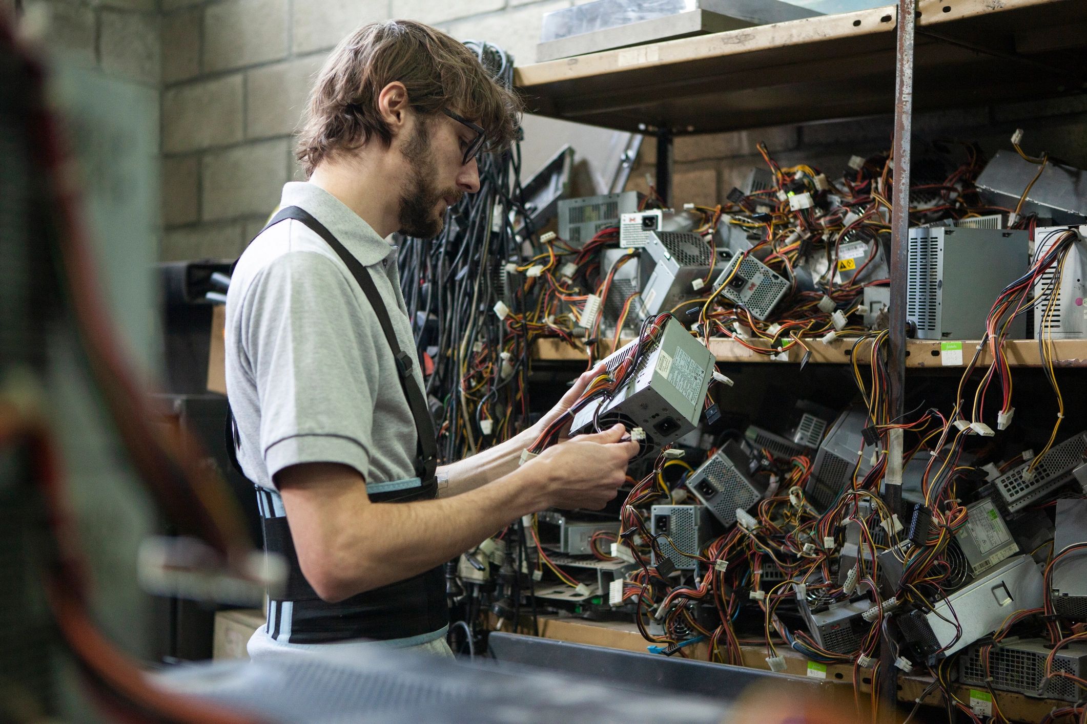 Technician inspecting computer components
