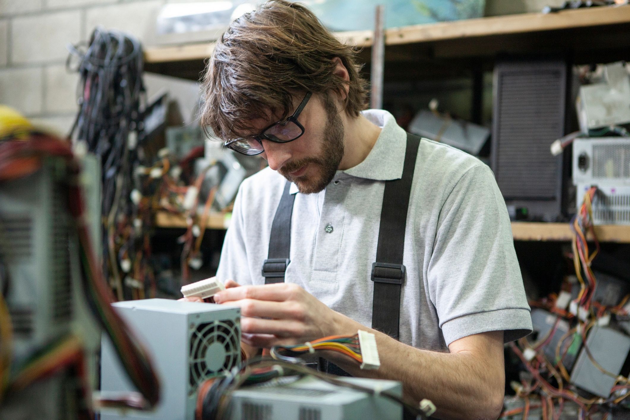 Technician inspecting computer components