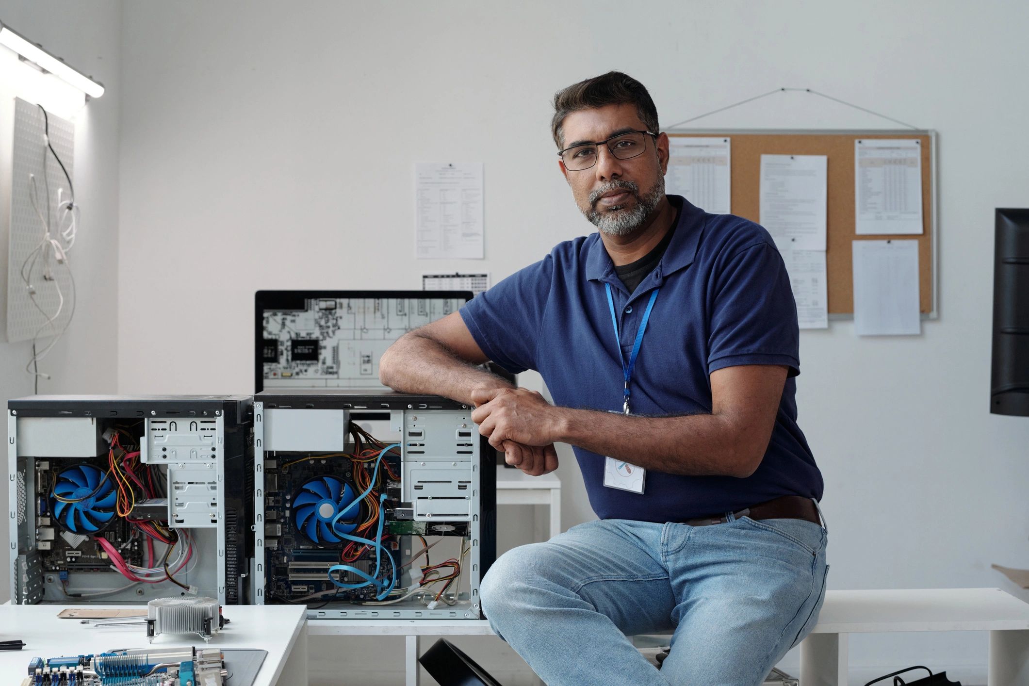 Technician in a computer repair workspace