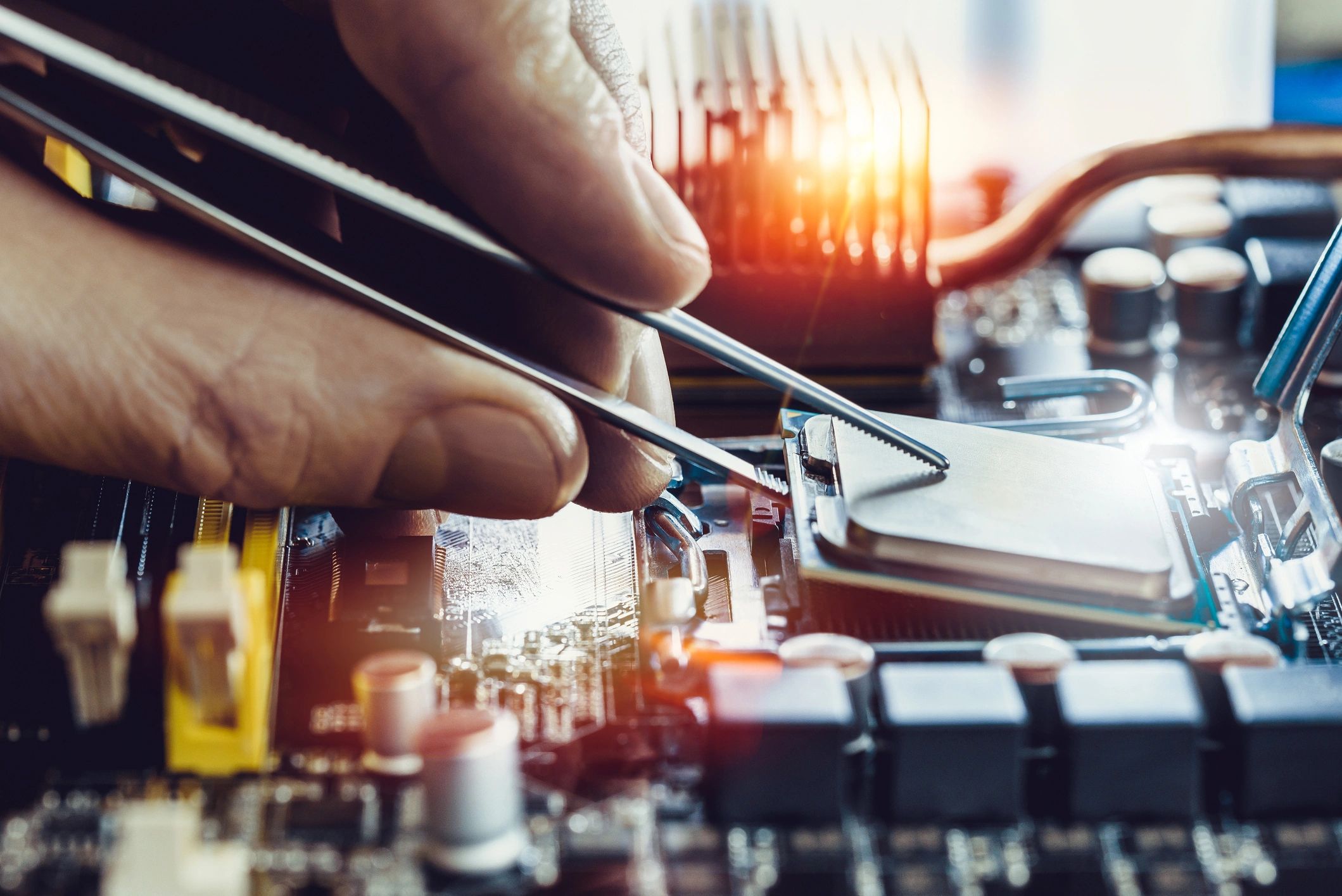 Technician repairing a desktop computer